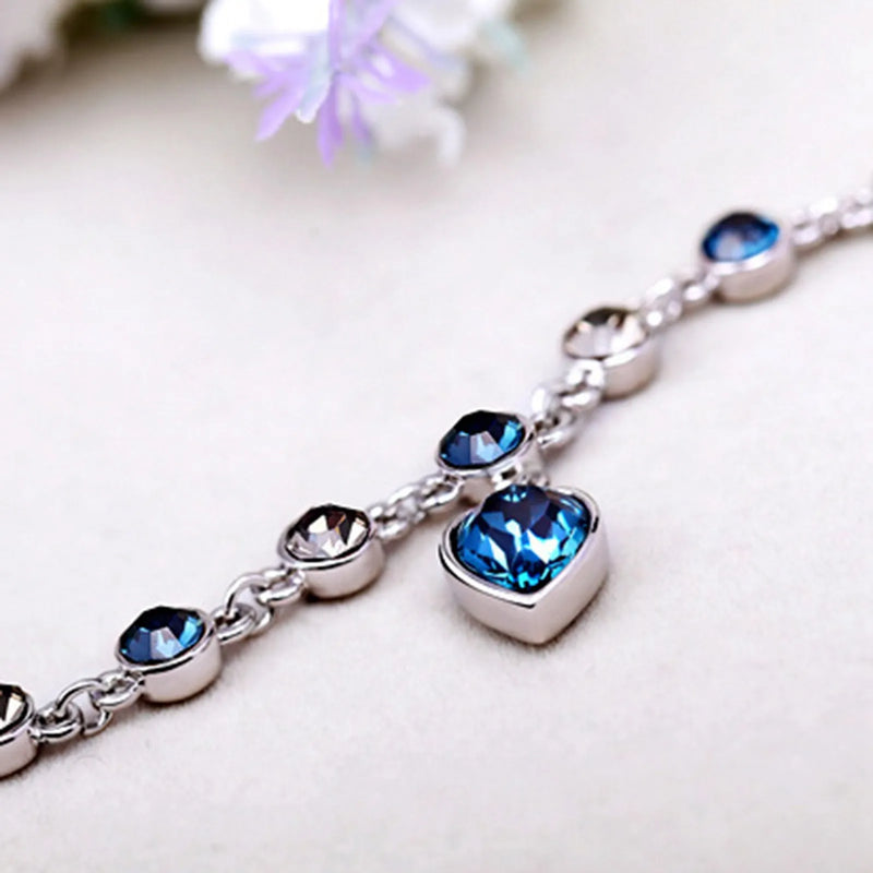 Bracelet in Silver with Heart Charm and Cubic Zirconia Links