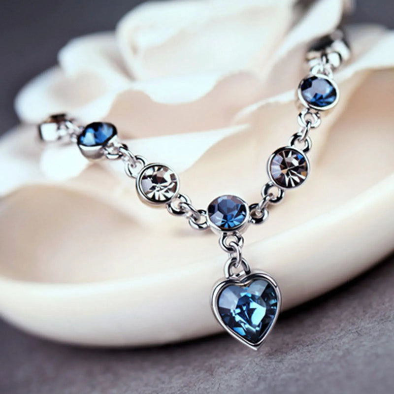 Bracelet in Silver with Heart Charm and Cubic Zirconia Links