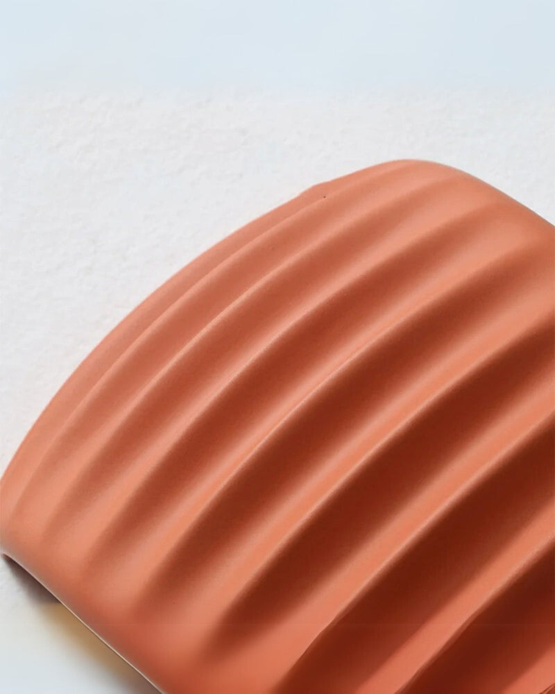 Textured Resin Wall Sconce with Wavy Design & Up-Down Ambient Lighting