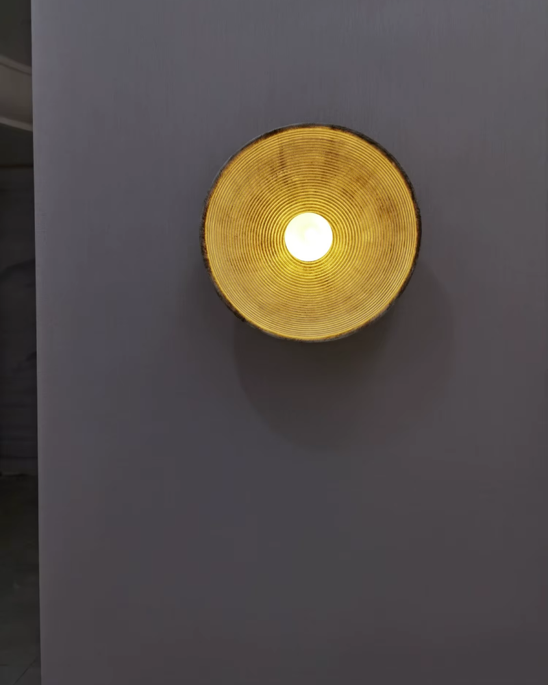 Textured Resin Wall Sconce with Concentric Design & Soft Ambient Glow