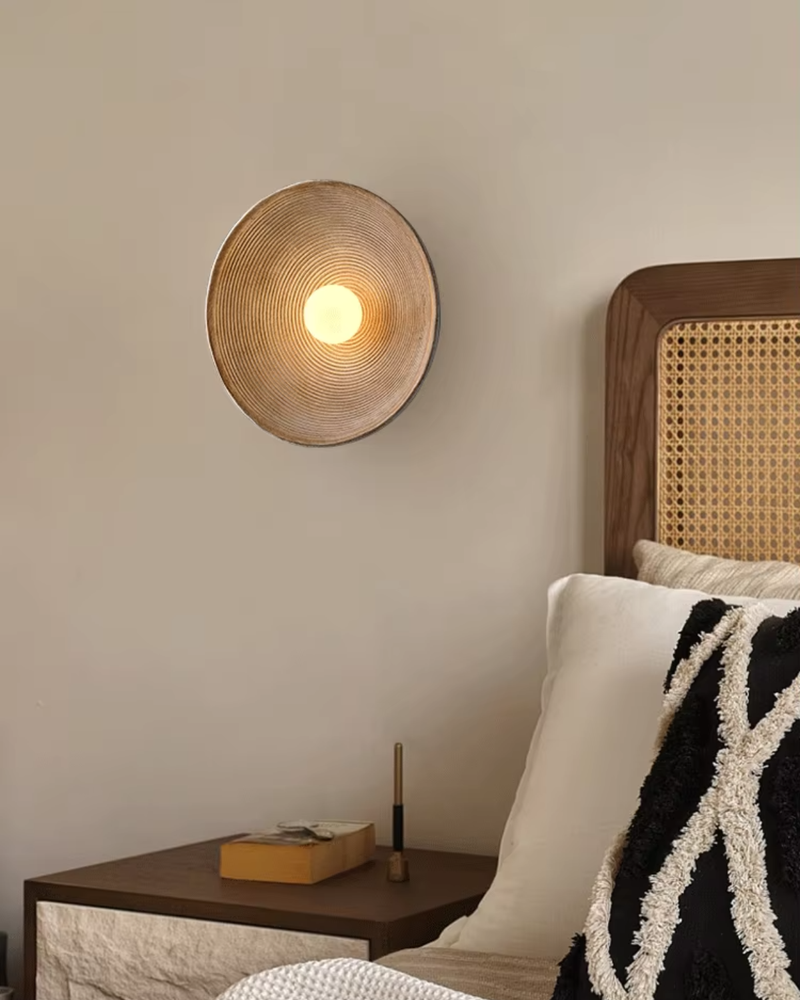 Textured Resin Wall Sconce with Concentric Design & Soft Ambient Glow