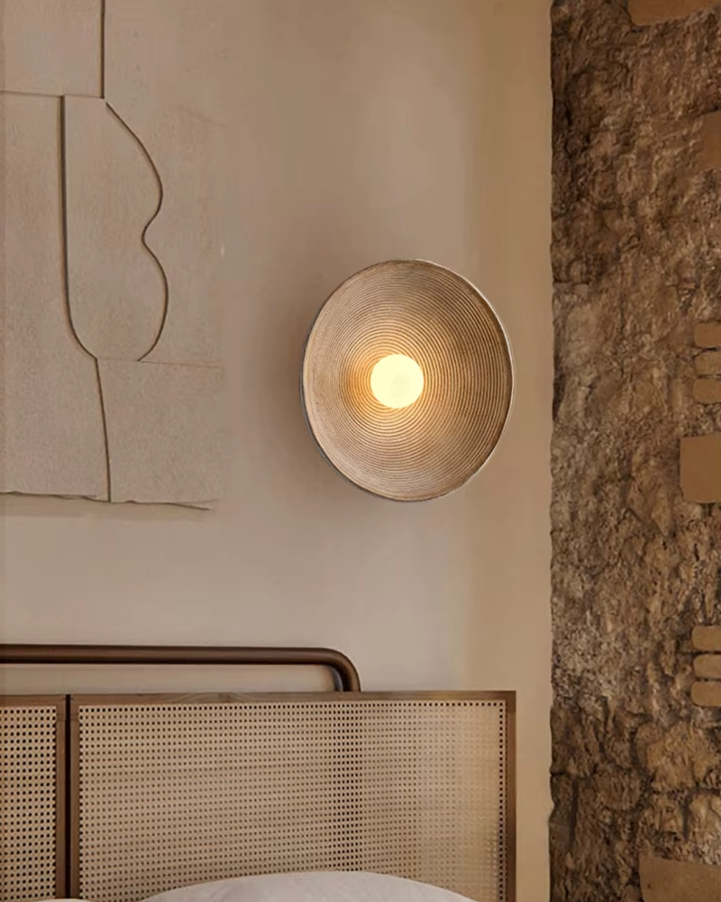 Textured Resin Wall Sconce with Concentric Design & Soft Ambient Glow