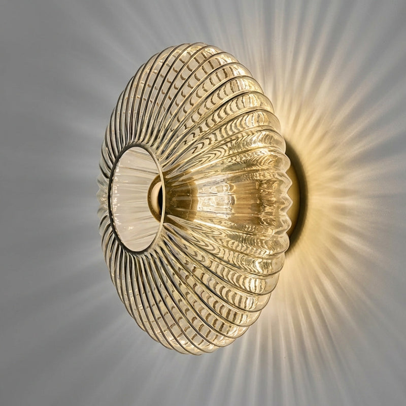 Sculpted Ribbed Glass Wall Light with Warm Ambient Glow