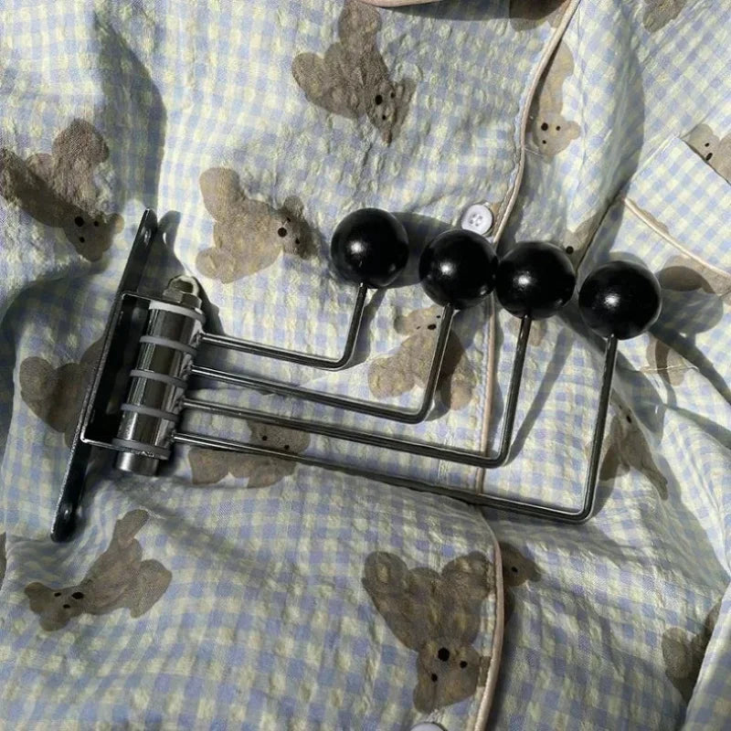 Rotating Metal Wall Hook Rack with Rounded Knobs