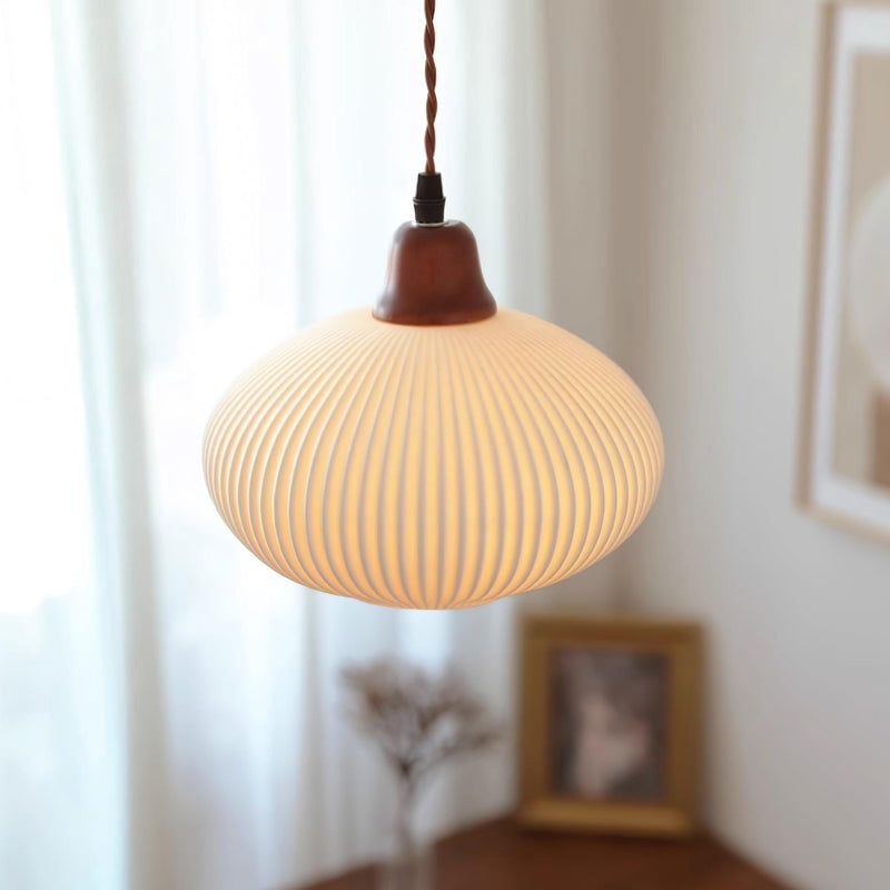 Ceramic Pendant Light with Ribbed Design and Wooden Details for Atmospheric Lighting