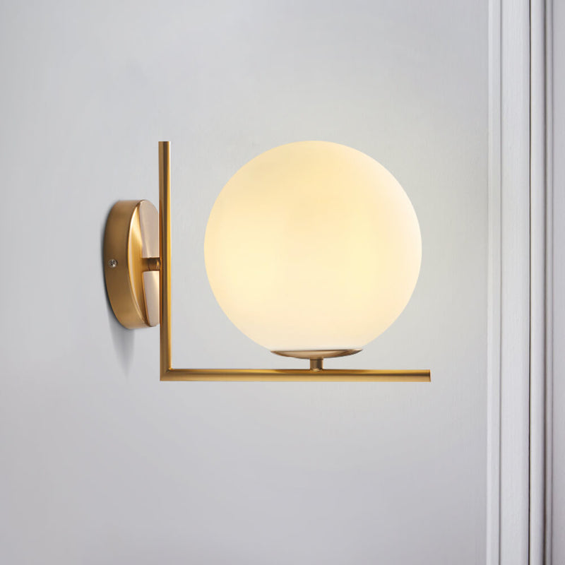 Antique Brass Globe Wall Sconce with Opal Glass Shade