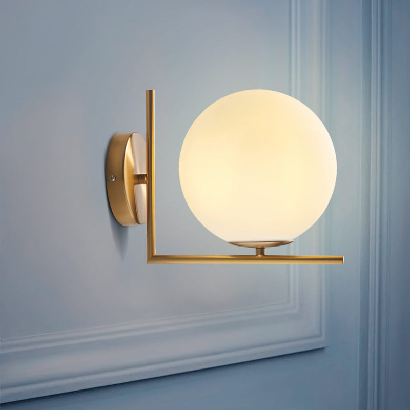 Antique Brass Globe Wall Sconce with Opal Glass Shade
