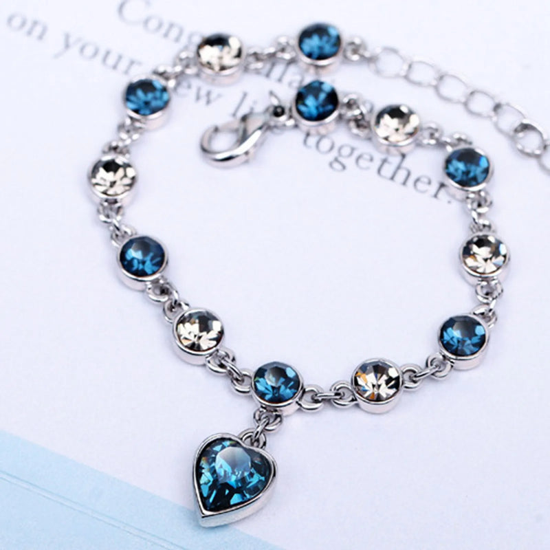 Bracelet in Silver with Heart Charm and Cubic Zirconia Links