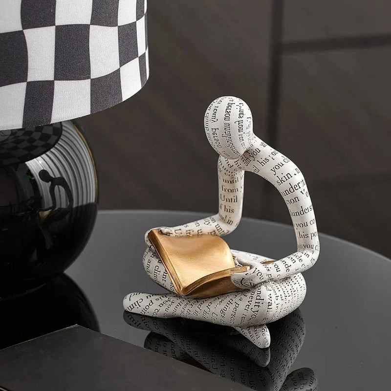 Abstract Reading Figure Resin Sculpture with Gold Book