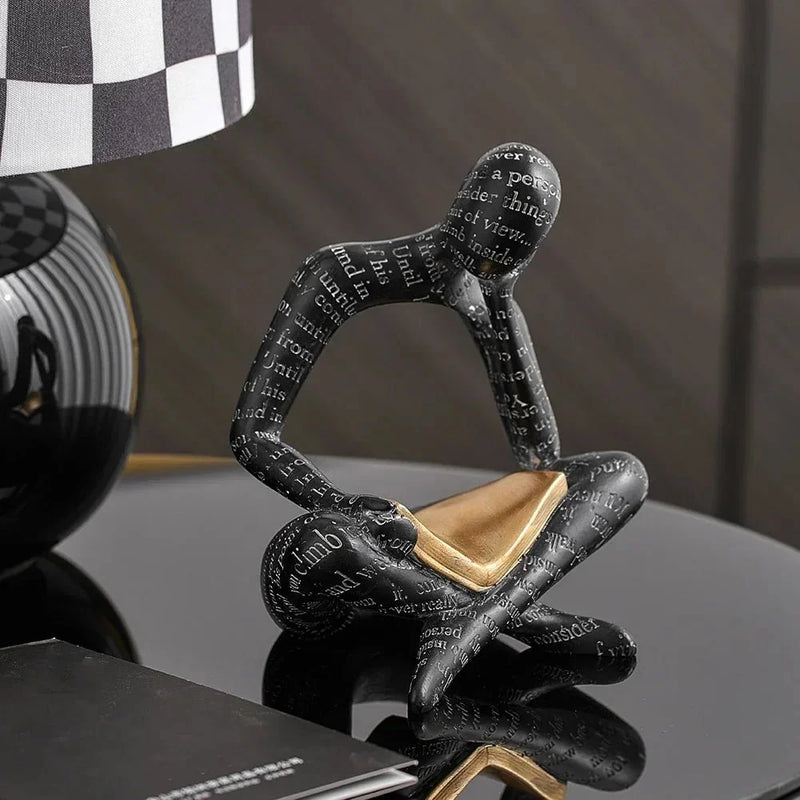 Abstract Reading Figure Resin Sculpture with Gold Book
