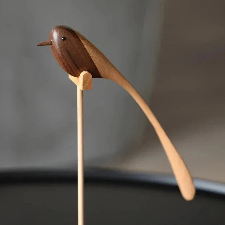 Carved Wooden Bird Sculpture with Long Sweeping Tail