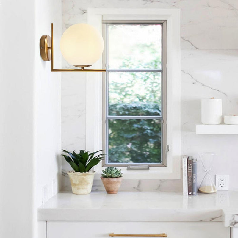 Antique Brass Globe Wall Sconce with Opal Glass Shade