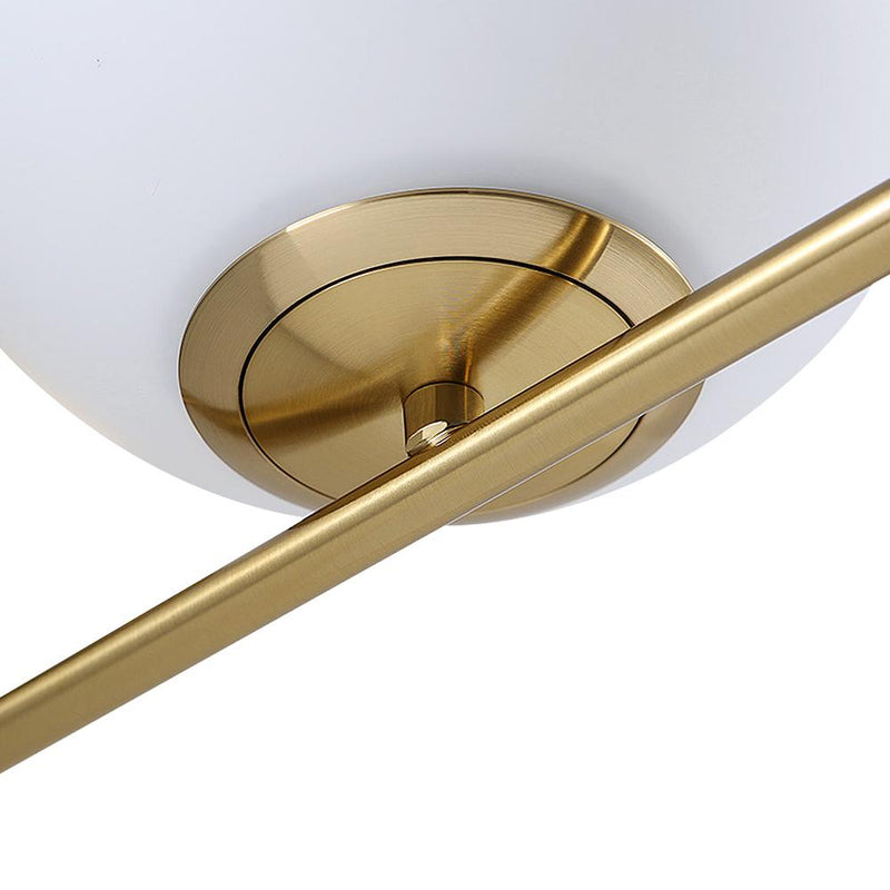Antique Brass Globe Wall Sconce with Opal Glass Shade