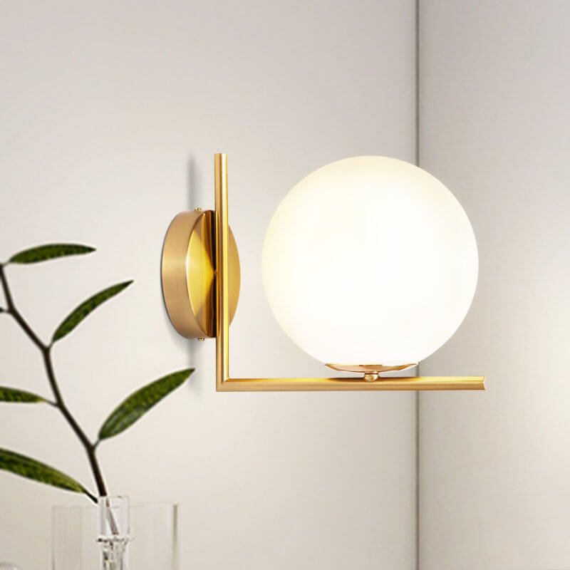 Antique Brass Globe Wall Sconce with Opal Glass Shade
